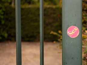 Sex sticker on pole Photo by the blowup on Unsplash